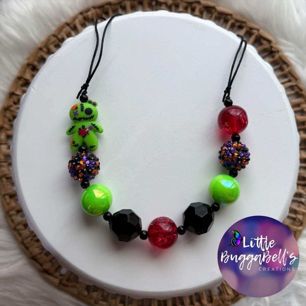Voodoo Doll Adjustable Bubblegum Necklace